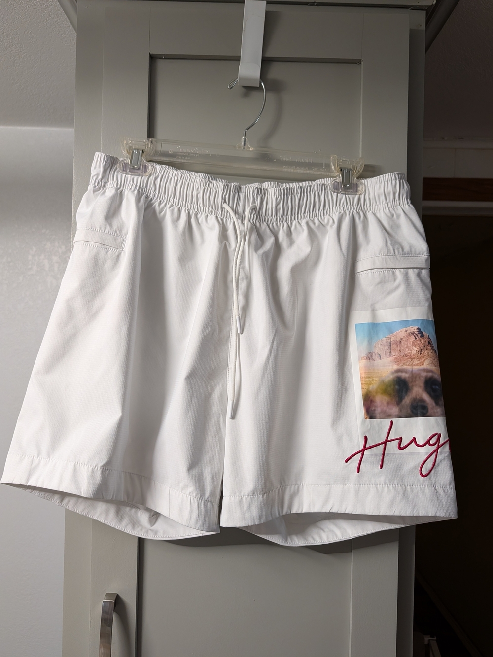 HUGO White Men's Swim Trunks with Photo Pocket and Red Script